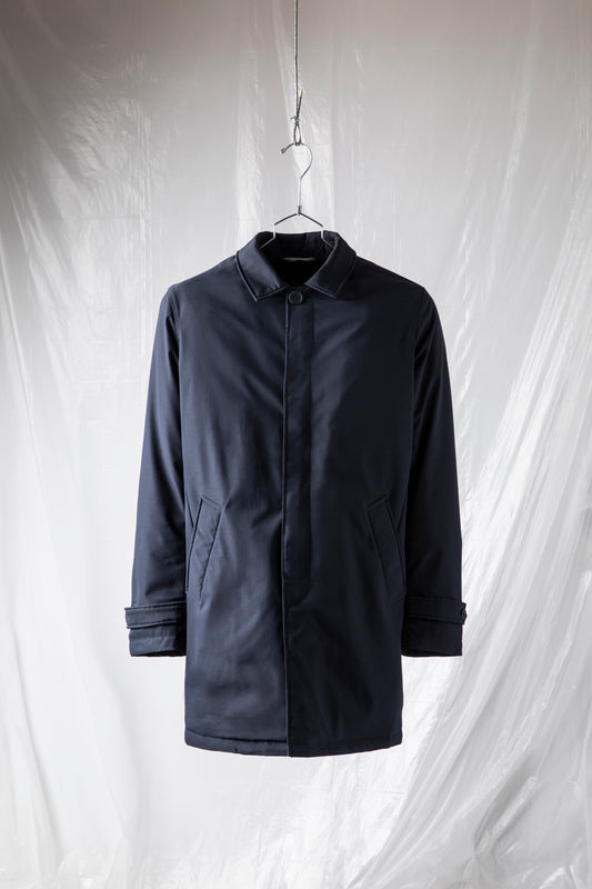 Technical coat with heat-sealed padding and color-matched buttons