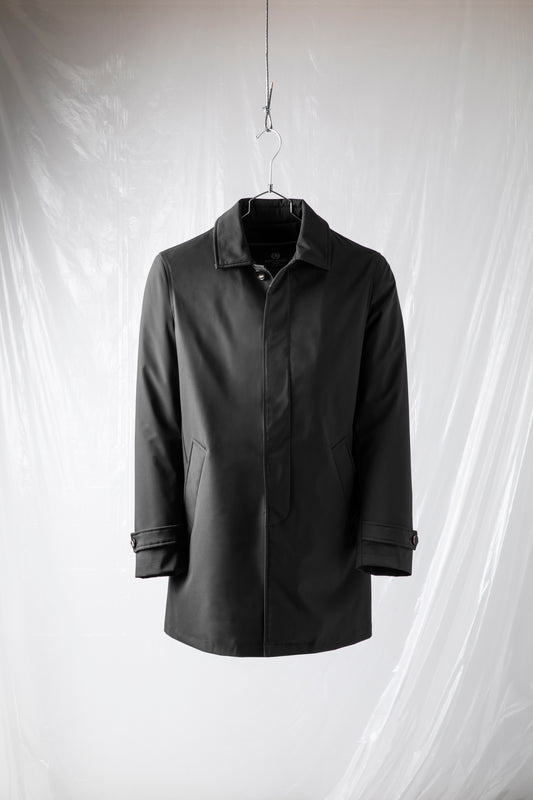 Technical coat with heat-sealed padding