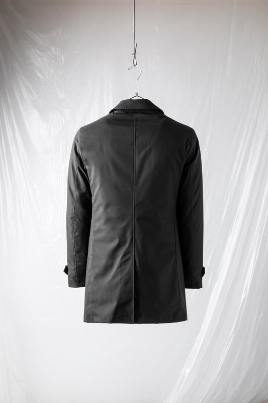 Technical coat with heat-sealed padding