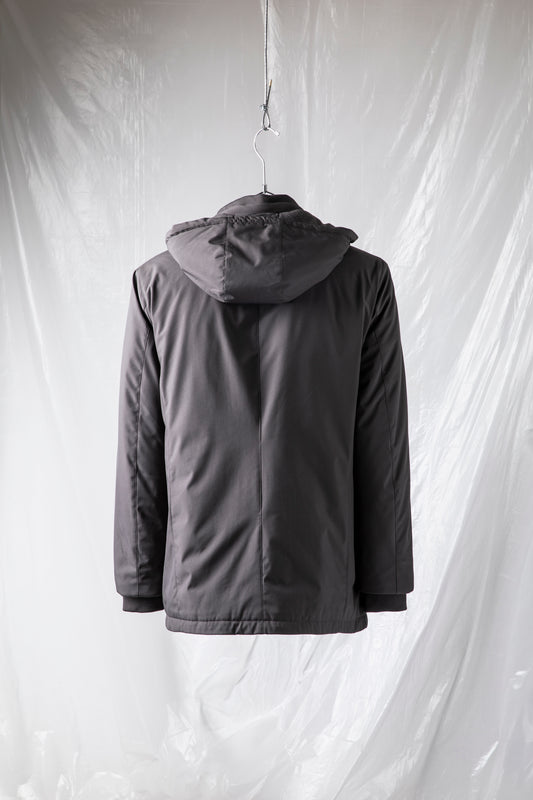 Padded jacket in technical fabric with detachable hood