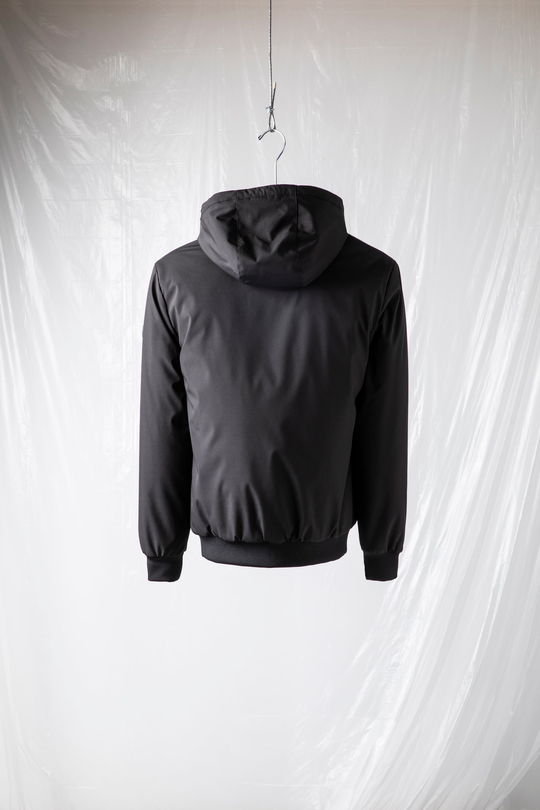 Short padded jacket in technical fabric